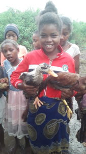 Fara with Chickens