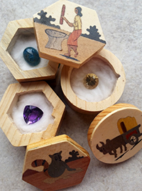 gemstones in hand-crafted boxes